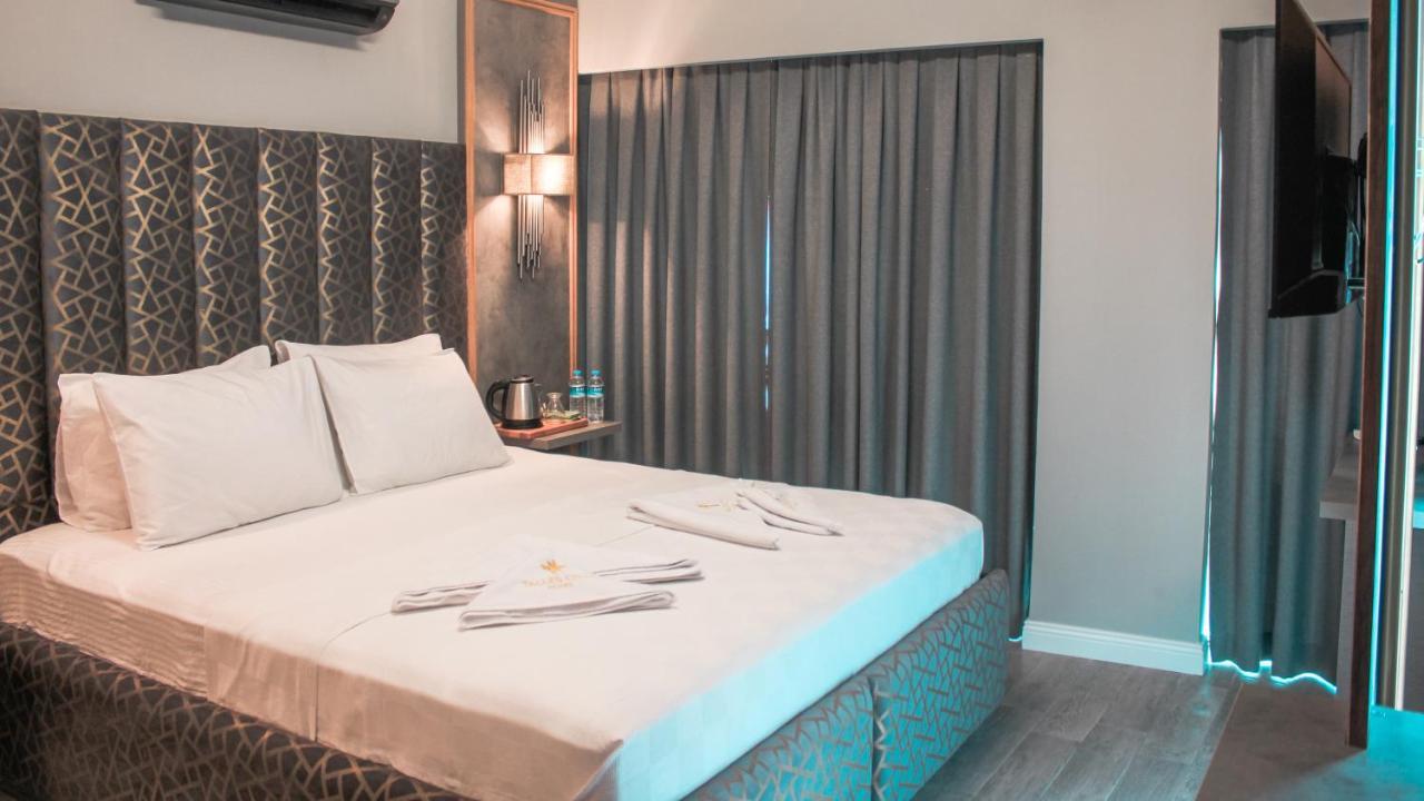 Talles City Hotel Izmir Bagian luar foto