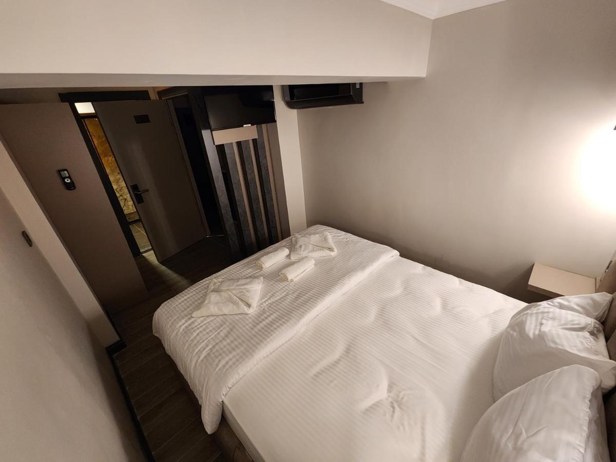 Talles City Hotel Izmir Bagian luar foto