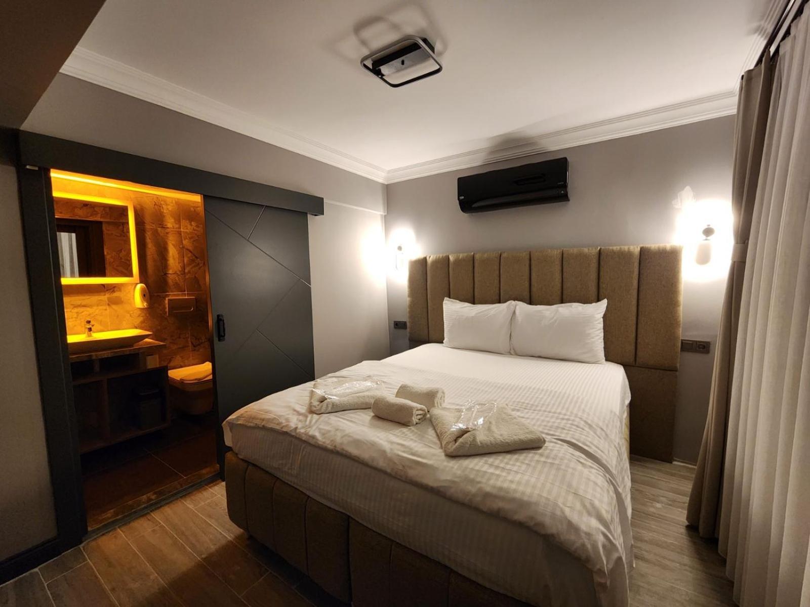 Talles City Hotel Izmir Bagian luar foto
