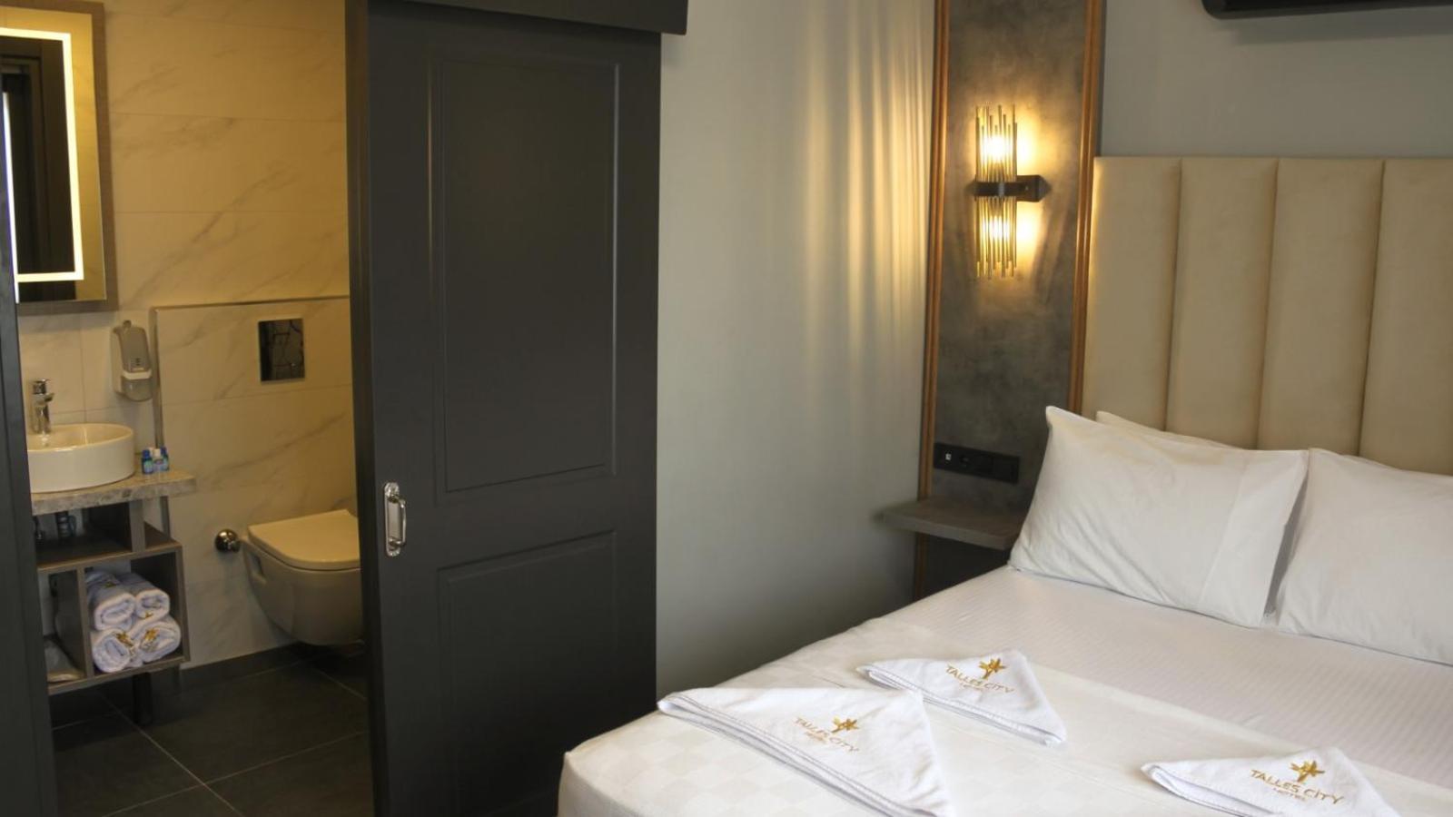 Talles City Hotel Izmir Bagian luar foto